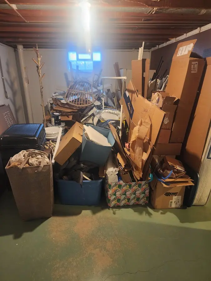 Roll-off dumpster container at job site for 2 Yard Dumpster Rental in Larkspur